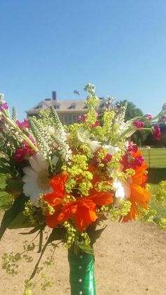 Orange, pink and white brides bouquet Stanford Hall wedding